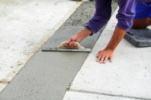 dallage beton finition taloche chape